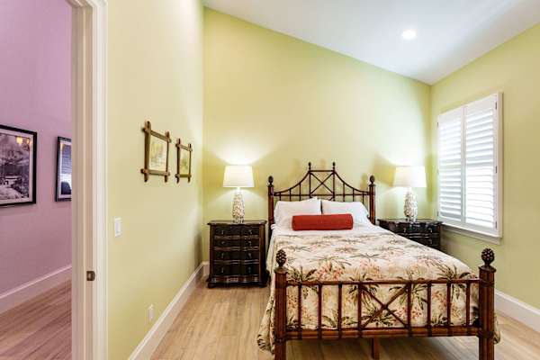 Bedroom Suite #2 with queen bed, with large closet and en-suite private bathroom.