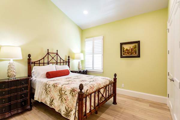 Bedroom Suite #2 with queen bed, with large closet and en-suite private bathroom.