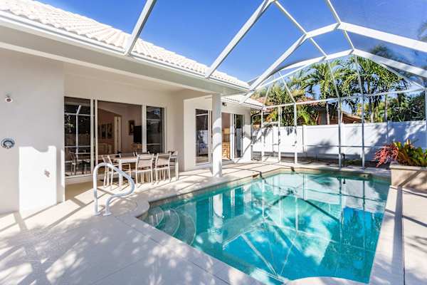 Beautiful Pool with dining area, gas grill, outdoor half bathroom and shower