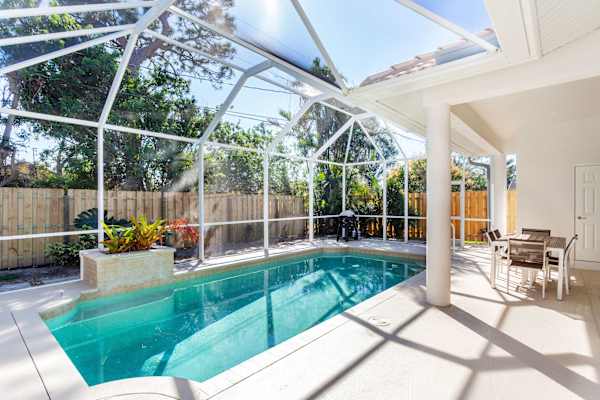 Beautiful Pool with dining area, gas grill, outdoor half bathroom and shower