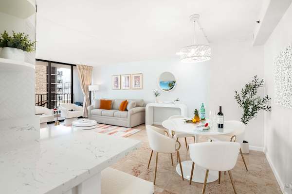 Dining area with table and 4 chairs perfect for shared meals.