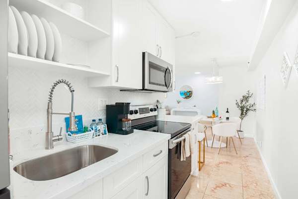 Fully equipped kitchen with full-size appliances.