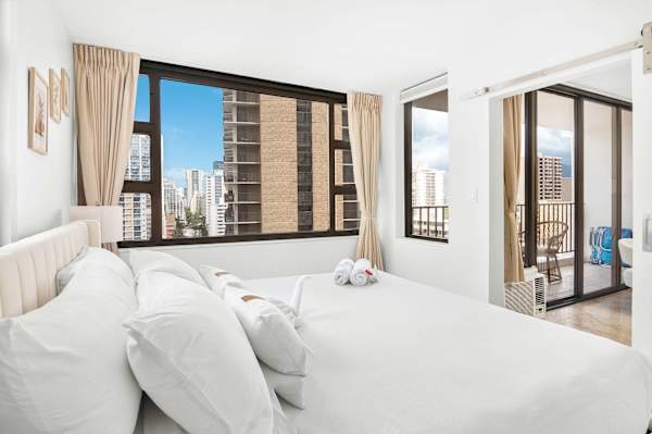 Relax in your bedroom with a king-size bed and beautiful views.