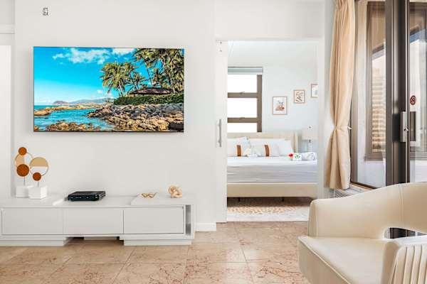 Enjoy watching your favorite movies with your 65'' Samsung Smart TV in your living room.