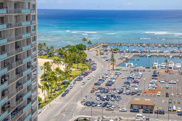 A gorgeous view overlooking the Ala Wai Boat Harbor, Magic Island, and the sparkling blue waters of Waikiki.