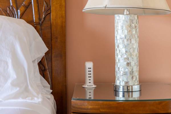 Enjoy modern convenience with USB ports on the bedside table—easily charge phones, tablets, and alarms without hunting for adapters or outlets.