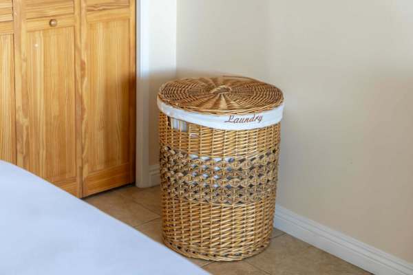 Laundry basket included for easy, fresh clothes during your stay.