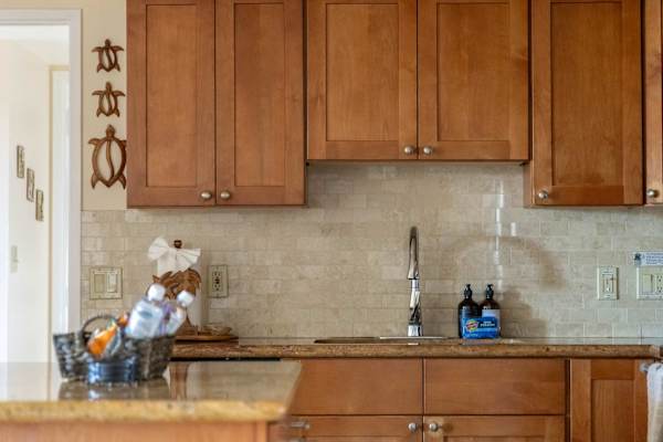 Have your kitchen like home—maximize utility with a wide sink area, a number of multifunctional cabinets, various cookwares, and full-sized appliances.