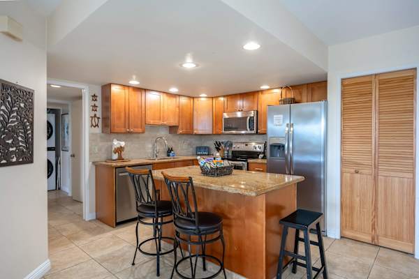 Keep it versatile with this kitchen island that also seats four—perfect for casual breakfasts, evening cocktails with friends, or spreading out meal prep while staying part of the conversation.