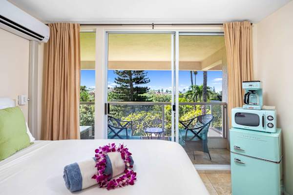 This unit provides access to the balcony with convenient glass doors, also allowing direct view of the calm nature outside. Enjoy the view while on bed or step out and soak in the serene gust of nature.