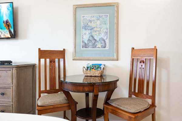 Enjoy intimate breakfasts or late-night wine in this table for two, right within the bedroom.