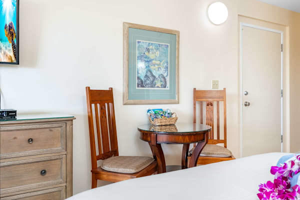 Enjoy intimate breakfasts or late-night wine in this table for two, right within the unit.