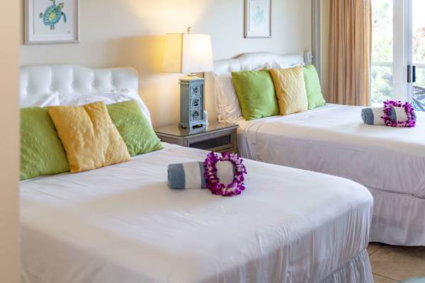 Sink into the comfort of these plush queen mattresses, ideal for a quick reset or a restful night's sleep