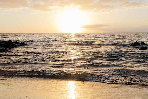 Watch the sun melt into the horizon from the beach as you unwind and share the moment with the people you’re with—an easy setting for connection, conversation, and quiet togetherness.