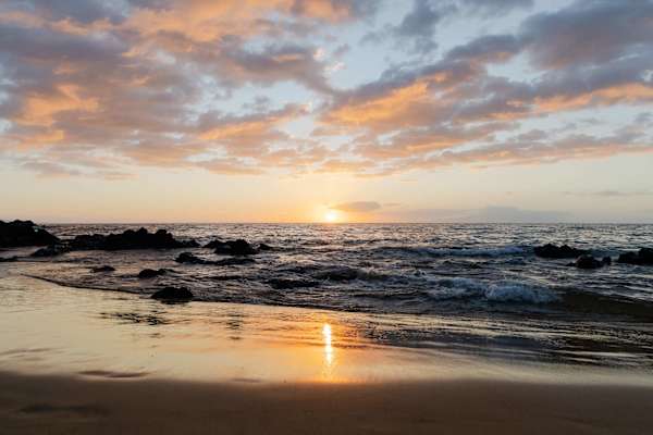 Watch the sun melt into the horizon from the beach as you unwind and share the moment with the people you’re with—an easy setting for connection, conversation, and quiet togetherness.