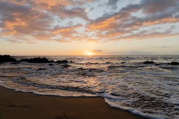 Watch the sun melt into the horizon from the beach as you unwind and share the moment with the people you’re with—an easy setting for connection, conversation, and quiet togetherness.