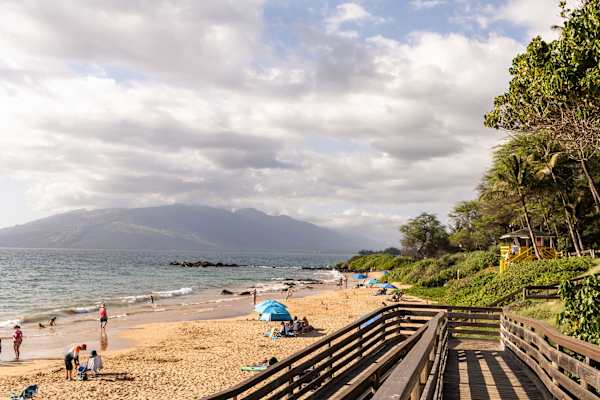 Soak in island bliss at Kamaole Beach Park—where guests can lounge on soft sands, snorkel in clear waters, and catch unforgettable sunset views just steps away.