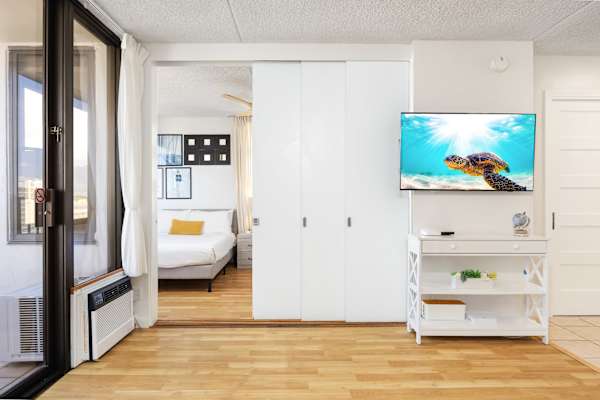Your living area is separated from your bedroom by a sliding door