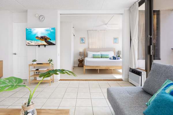 The bedroom is situated just right across the living room with a handy sliding door—easy to wander between spaces, or slide it shut for a cozy, private retreat.