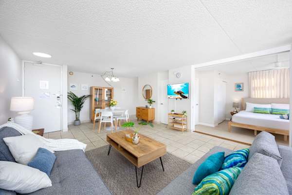 The bedroom is situated just right across the living room with a handy sliding door—easy to wander between spaces, or slide it shut for a cozy, private retreat.
