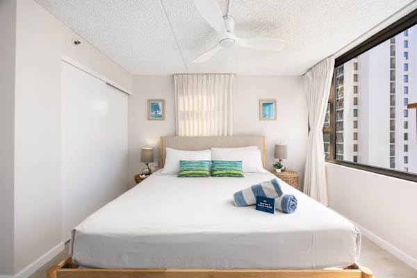 This bedroom features a comfortable king bed that invites you to relax and unwind, offering the perfect space for a truly restful stay.