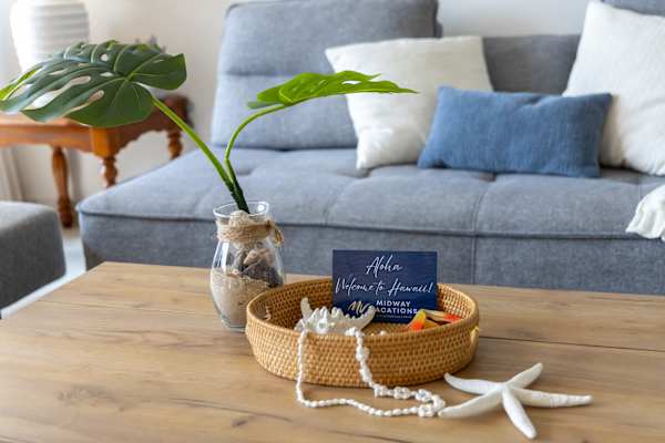 The living room is adorned by carefully selected decorative details that adds to its modern-minimalist styling.