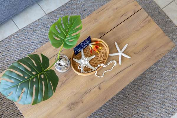 The living room is adorned by carefully selected decorative details that adds to its modern-minimalist styling.