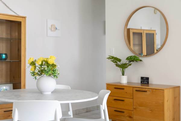 The dining table seats four—perfect for shared meals and lively conversations.