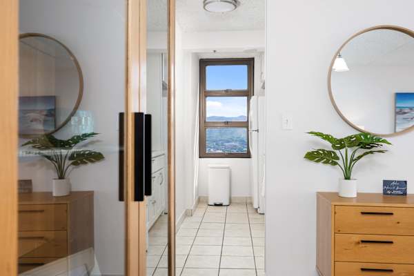 The kitchen area is built with an ample space to move around. It is also equipped with refrigerator, stove, microwave, and other essential kitchen tools for added convenience during your stay.