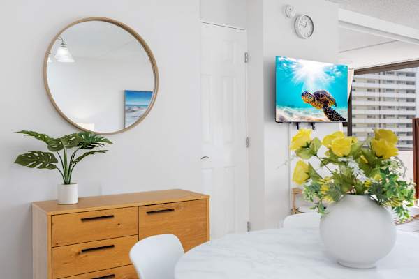 The living room is adorned by carefully selected decorative details that adds to its modern-minimalist styling.