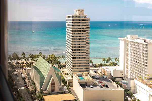 Sweeping ocean views overlooking Waikiki skyline, palm-lined streets & turquoise water