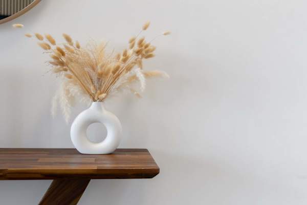 Minimalist console table styled w/ vase & dried grasses