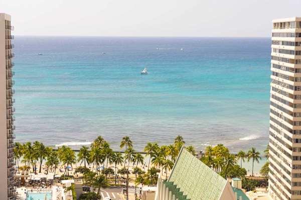 Sweeping ocean views overlooking Waikiki skyline, palm-lined streets & turquoise water