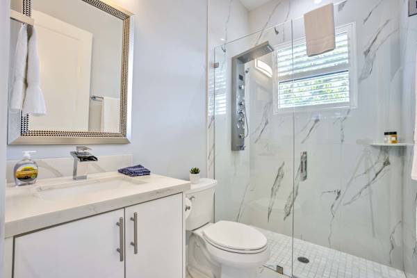 Bright And Modern Third Bathroom With Walk-In Shower And Toilet