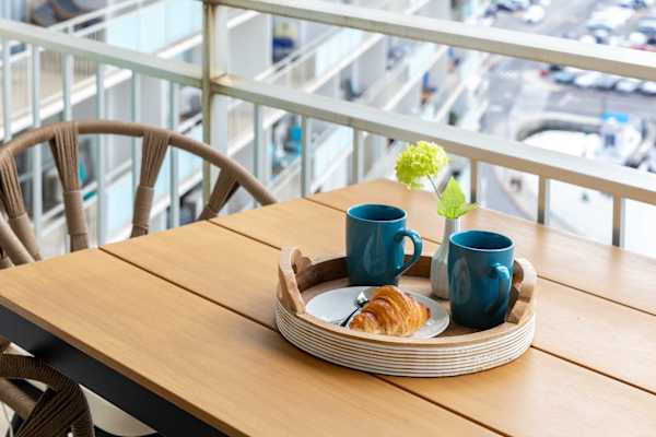 Sip your morning coffee on a private balcony while enjoying the mix of ocean and city views, all while soaking in the cool island breezes.