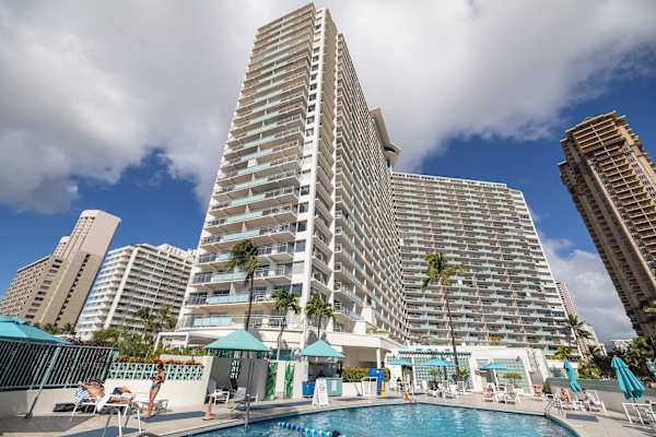 Dive into luxury at the Ilikai Hotel’s sun-soaked pool deck, rising high above the heart of Waikiki for the ultimate island lifestyle.
