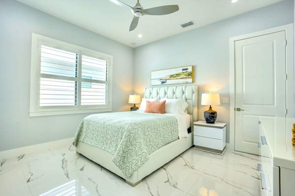 Beautiful Queen Bedroom With Elegant Décor;  Ceiling Fan; Flat-Screen TV; Natural Light; Walk-In Closet