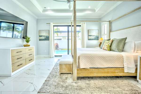 Elegant Master Bedroom With King Bed; Ceiling Fan; Flat-Screen TV; Direct Access To The Pool Area And Master Bathroom