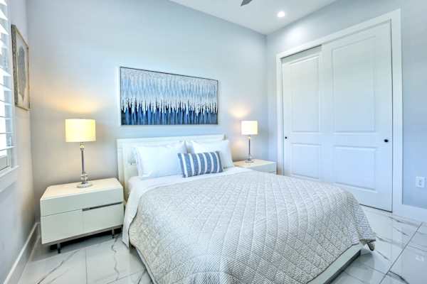 Third Bedroom  with Queen Bed; Flat-Screen TV, And Walk-in Closet