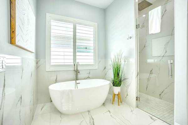 Master Bathroom; Luxurious, & Bright with frestanding Bathtub & Walk-in Shower