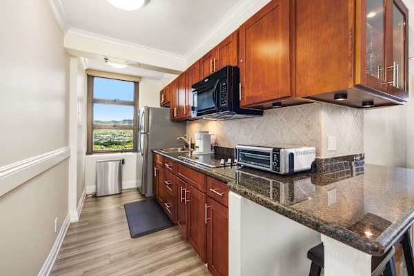 Your fully equipped kitchen has an air fry oven, microwave, and refrigerator with freezer.
