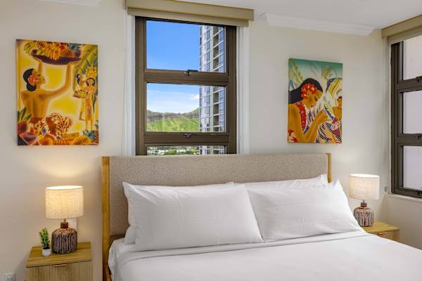 Relax in your bedroom with a king-size bed and great ocean views.
