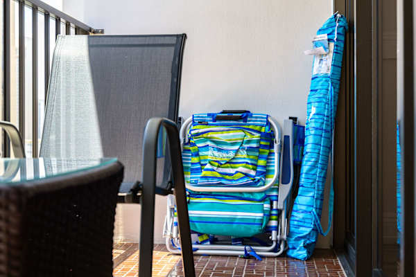 We provide 2 beach chairs, a beach umbrella, and a beach mat ready for your beach use!
