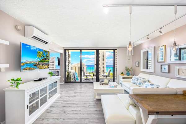Bright living room with ocean views and modern coastal decor