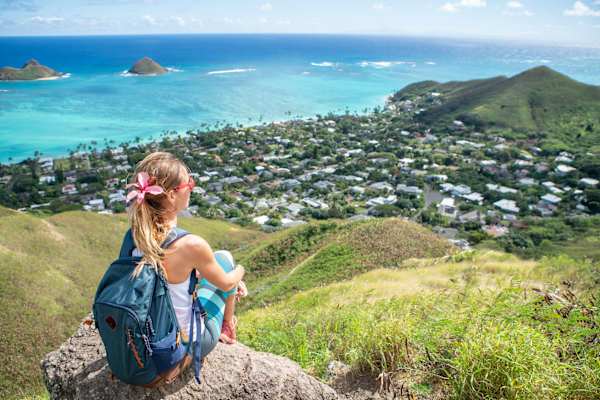 Soak in the ultimate island view from the Lanikai Pillboxes, where the iconic "Mokes" sit perfectly framed by Oahu’s most vibrant turquoise waters.