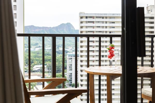 Sip your morning coffee on a private balcony with views of Diamond Head mountain and cool island breezes.