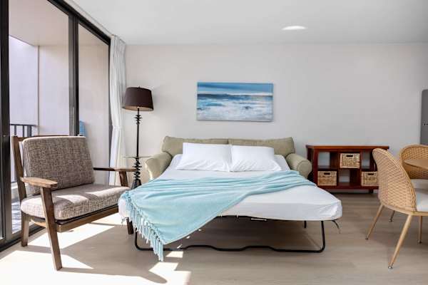 Relax on your pull-out sleeper sofa in the living area after a day of adventure!