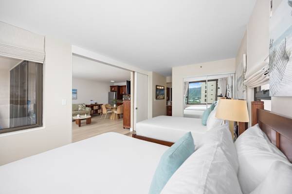 This bright condo features 2 queen beds and a seamless open-concept design that leads directly into an inviting living and dining area.