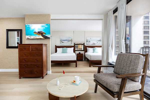 The bedroom is situated just right across the living room with a handy sliding door, easy to wander between spaces, or slide it shut for a cozy, private retreat.