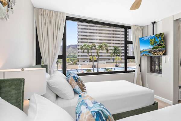 Relax in your bedroom with 2 queen beds.